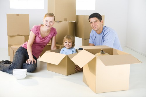 Planned household storage arrangement with labelled containers