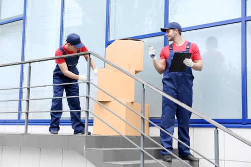 A clean self storage corridor showing safety signage and organized unit access