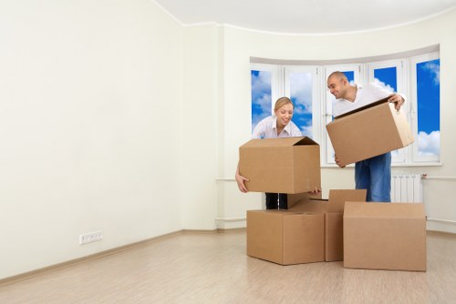 Apartment moving service preparing furniture for transport in Sanderstead