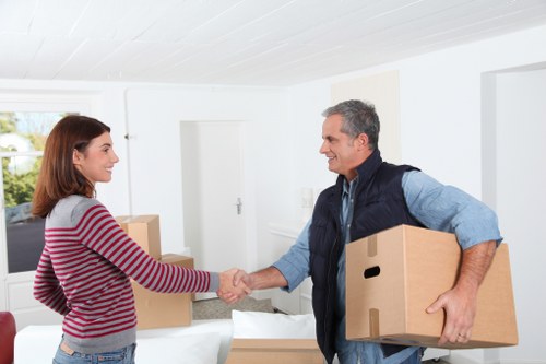 Professional movers loading furniture in Sanderstead